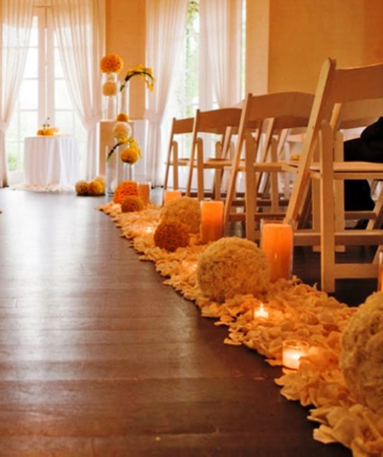 Indoor wedding-aisle candle decorations