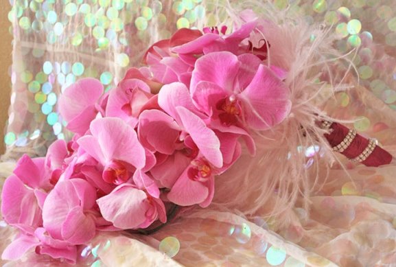 Chic modern fuchsia-phaleanopsis-orchids-feather bridal bouquet