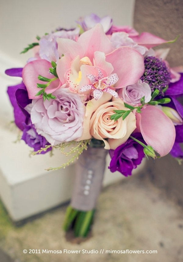 Stylish purple and pink beach wedding bouquet