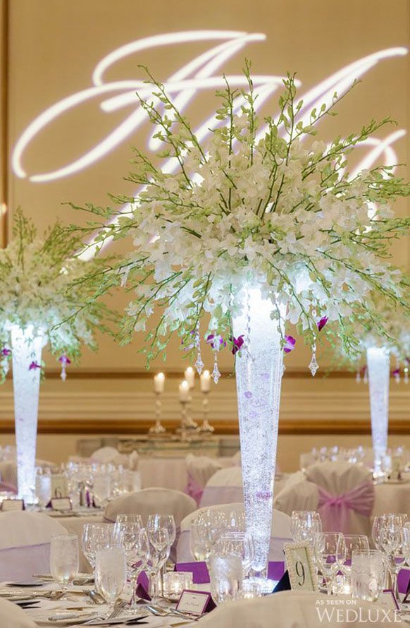 Tall white orchids wedding centerpiece idea
