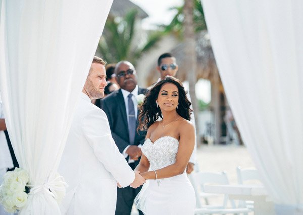 Glam Hard Rock Punta Cana Wedding Ceremony Exchanging vows By Weddings Romantique