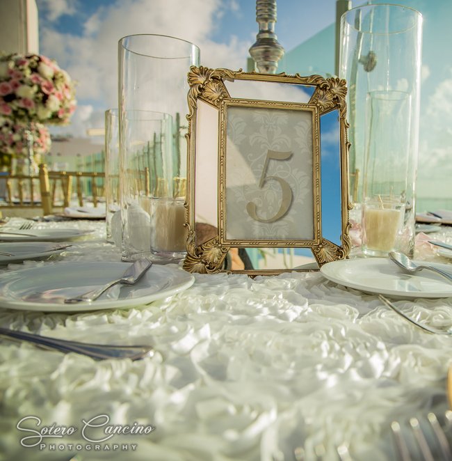 Stylish Beach Palace Sky Terrace ReceptionTable number by Weddings Romantique